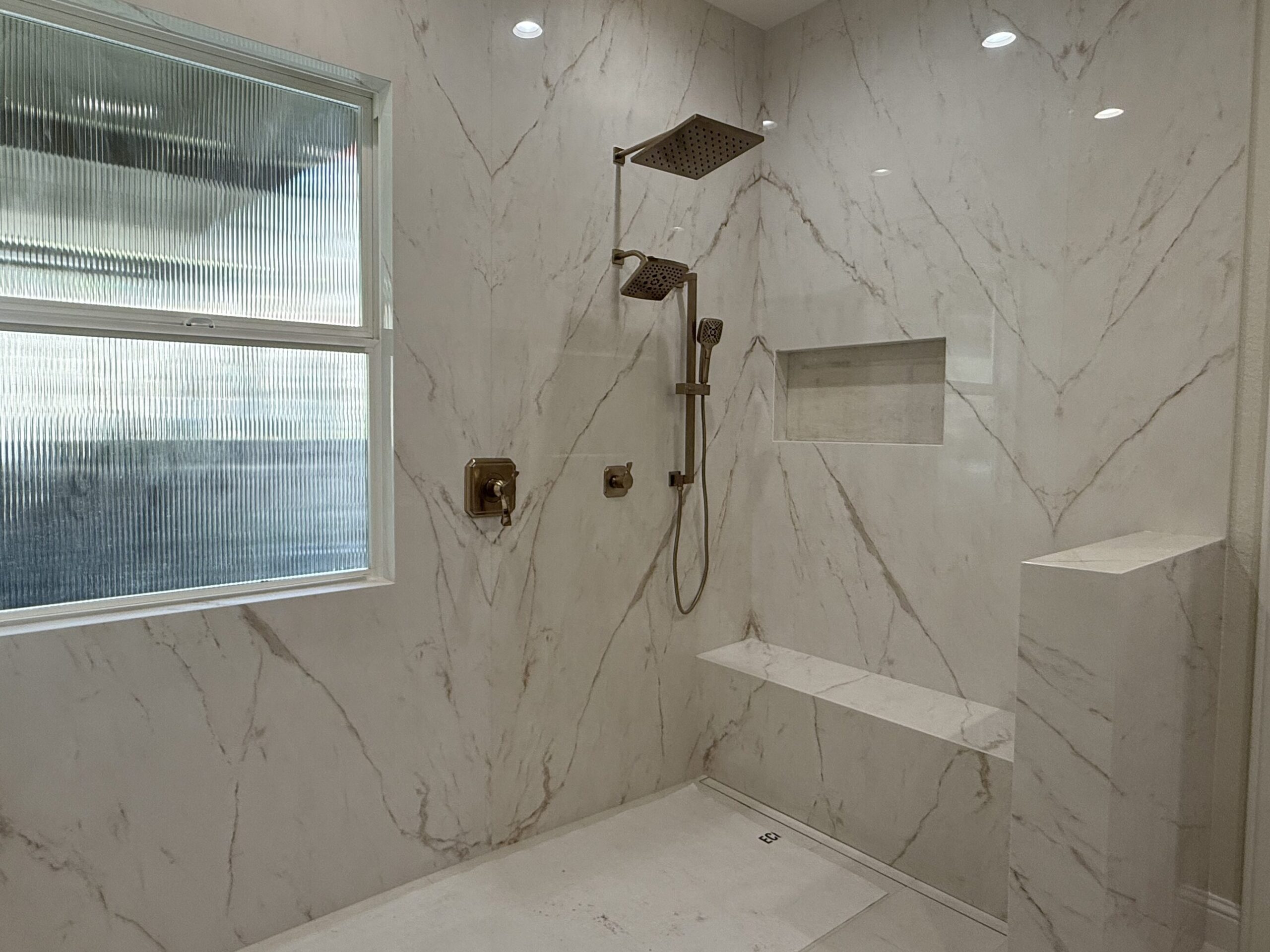 Custom Magnifica porcelain shower surround with matching pattern