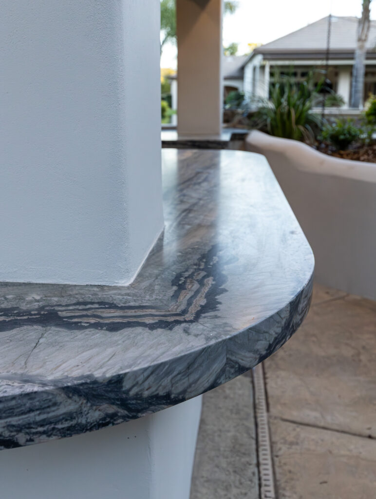Stone Crafters outdoor kitchen installation with custom countertop Edge profile